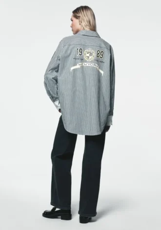 Camisa a rayas con el logotipo de 1989