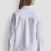 Camisa de popelín con botones de pedrería Camisa de popelín con botones de pedrería