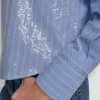 Camisa de popelín con botones y lentejuelas