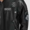 Chaqueta bomber de mangas largas con pins y parches