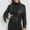 Chaqueta corta con flecos y mangas largas