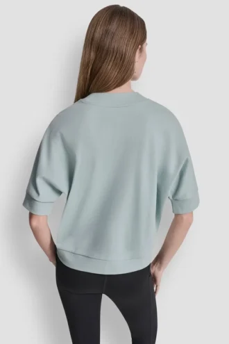 Jersey con logo DKNY 1989 con tachuelas