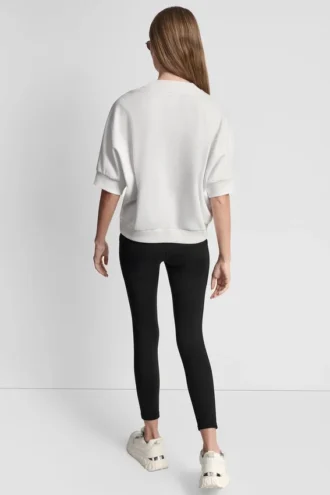 Jersey con logo DKNY 1989 con tachuelas