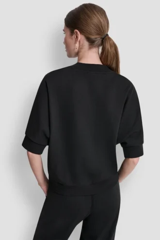 Jersey con logo DKNY 1989 con tachuelas