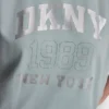Jersey con logo DKNY 1989 con tachuelas