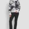 Jerséu oversize con intrincados detalles Jerséu oversize con intrincados detalles