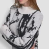 Jerséu oversize con intrincados detalles Jerséu oversize con intrincados detalles