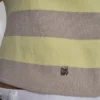 Jerséu polo sin mangas a rayas Jerséu polo sin mangas a rayas