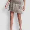 Mini falda con flecos y tachuelas