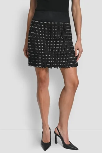 Minifalda de ante sintético con tachuelas y flecos