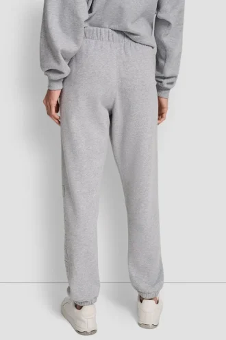 Pantalón jogger de talle alto con corte holgado y logotipo universitario de pedrería en relieve