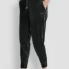 Pantalones Jogger ajustados con logotipo bordado en terciopelo