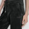 Pantalones Jogger ajustados con logotipo bordado en terciopelo