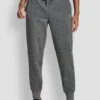 Pantalones Jogger con logo de pedrería y puños