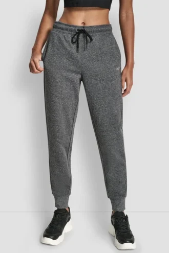 Pantalones Jogger con logo de pedrería y puños