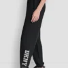 Pantalones Jogger con logo DKNY 1989 con tachuelas de strass