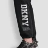 Pantalones Jogger con logo DKNY 1989 con tachuelas de strass