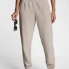 Pantalones Jogger con logotipo de pedrería y contorno bordado en relieve