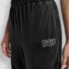 Pantalones Jogger de corte holgado con logo de terciopelo y pedrería