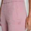 Pantalones Jogger de hilo de plumas con bolsillos y logotipo en el mismo tono