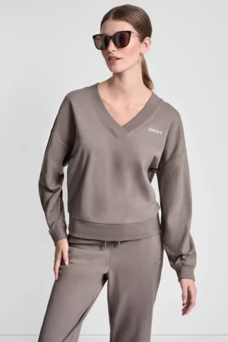 Suéter con cuello en V y logo burbuja metalizado